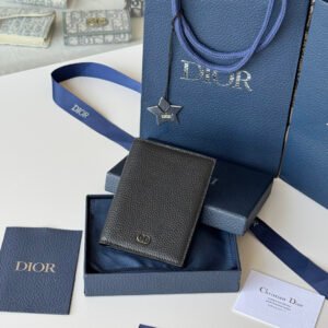 Passport Holder
This passport cover is both practical and elegant. Crafted from beige and black Oblique print fabric with Dior signature on the front and smooth black calf leather interior. Featuring two ticket compartments, a boarding pass compartment and five card slots. This passport holder is an ideal travel companion and can also be used as a card holder. Beige and black Oblique print Metallic-clad brass Dior signature on front Embossed Dior signature on interior Bi-fold style 2 receipt compartments 5 card slots Boarding pass compartment Dust bag included
Dimensions: 10 x 13.3cm
No.: H016-H020 Saddle Passport