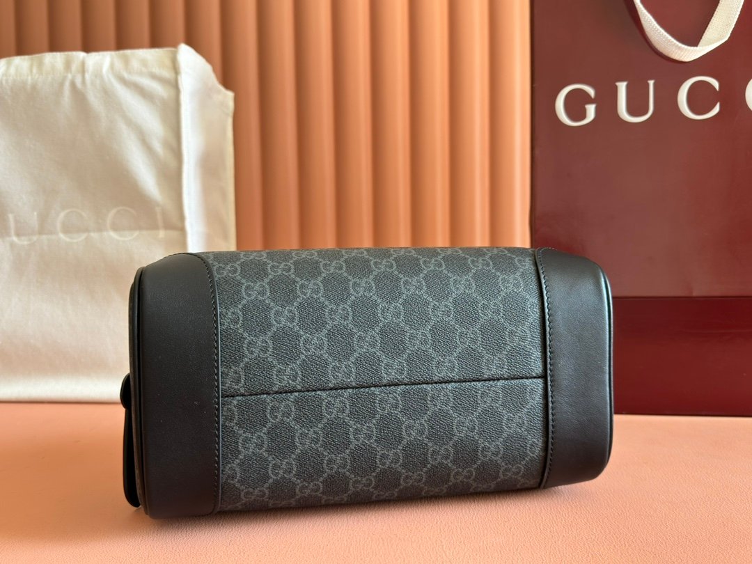 p390. 💋💋💋【Comes with a full set of packaging】The new GG Emblem series reinterprets the brand's timeless elegance and exquisite craftsmanship. Crafted from new beige and dark brown GG monogram coated fabric, this amenity bag features an interior pocket and convenient side handles.
New GG monogram coated fabric in beige and dark brown
Brown leather trim
Nylon lining
Interior: 1 zipper pocket
Side handle height: 5.5 cm
Zipper closure
Model: 821163.
Dimensions: 28cm (width) x 14cm (height) x 14cm (depth)
Weight: about 0.44kg
Color: Black original PVC leather.
Made in Italy - Image 4